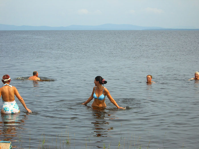 Купание на море Болонь